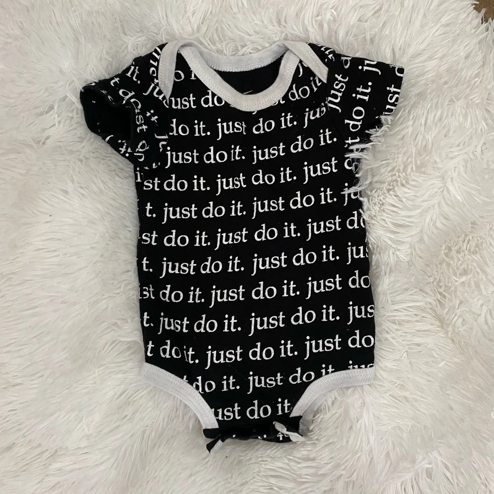 Nike baby Just do it logo black and white onesie 0-6 M